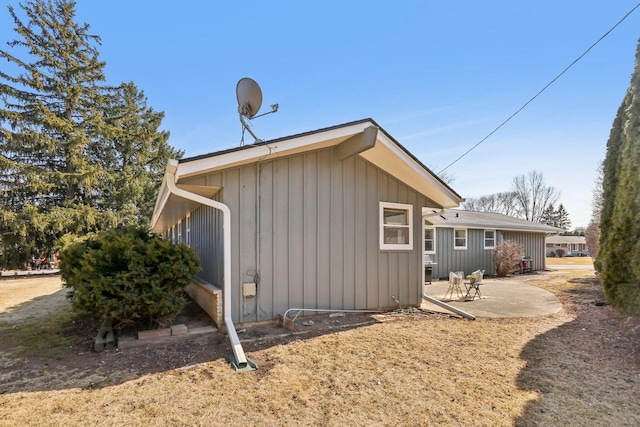 view of home's exterior featuring a patio