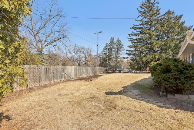 view of yard featuring a fenced backyard