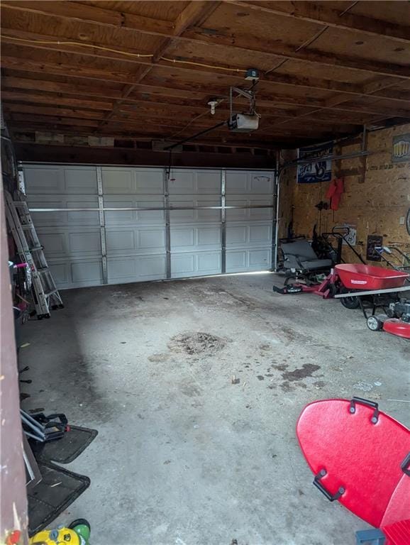 garage featuring a garage door opener