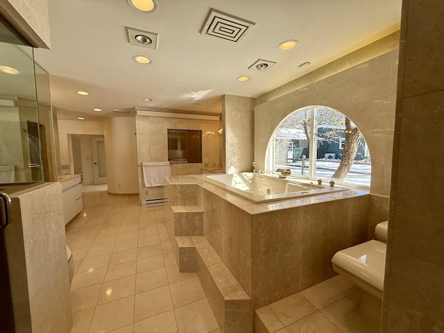 full bath featuring tile patterned flooring, a shower with shower door, toilet, vanity, and a bath