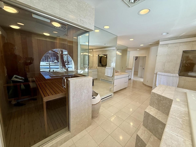 full bathroom with recessed lighting, visible vents, a stall shower, vanity, and tile patterned floors