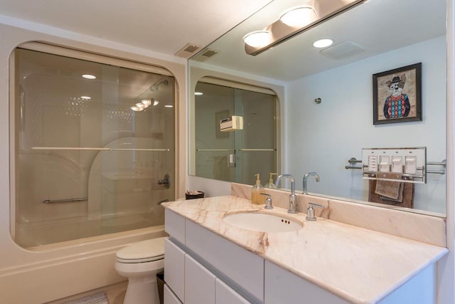 bathroom featuring visible vents, shower / bathing tub combination, vanity, and toilet