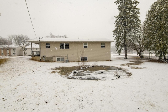 view of snow covered property