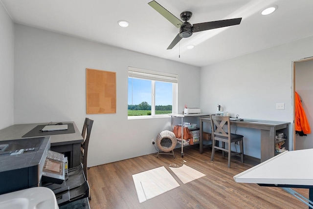 office space with a ceiling fan, recessed lighting, and wood finished floors