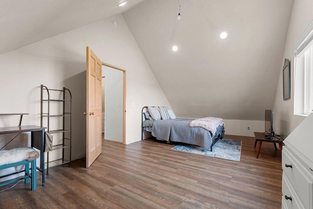 bedroom featuring recessed lighting, vaulted ceiling, and wood finished floors