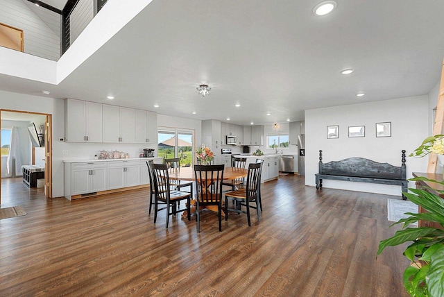 dining area featuring dark wood-style floors and recessed lighting