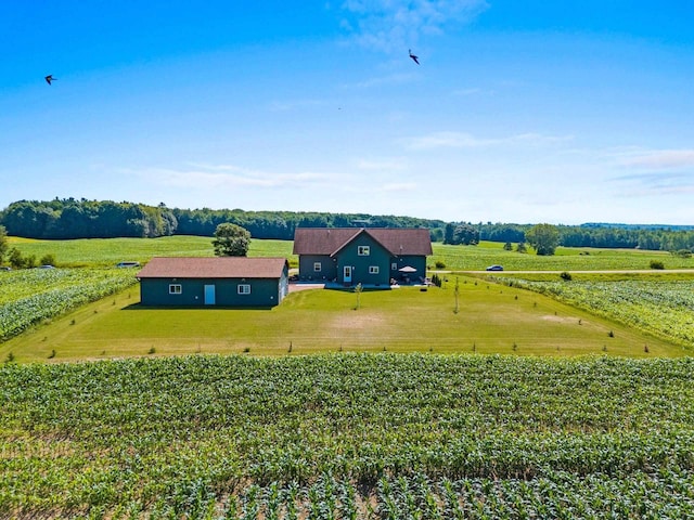 birds eye view of property with a rural view