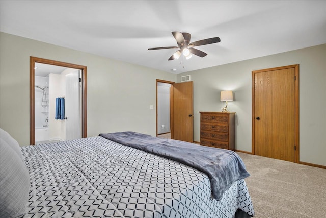 carpeted bedroom with baseboards, visible vents, and a ceiling fan