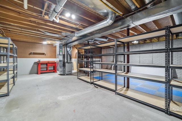 unfinished basement with heating unit