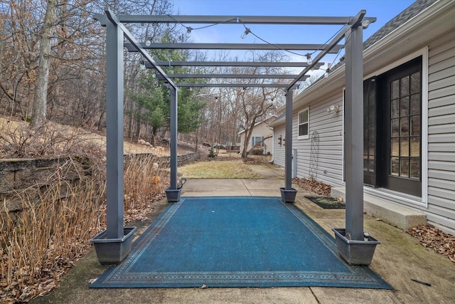 view of patio featuring a pergola