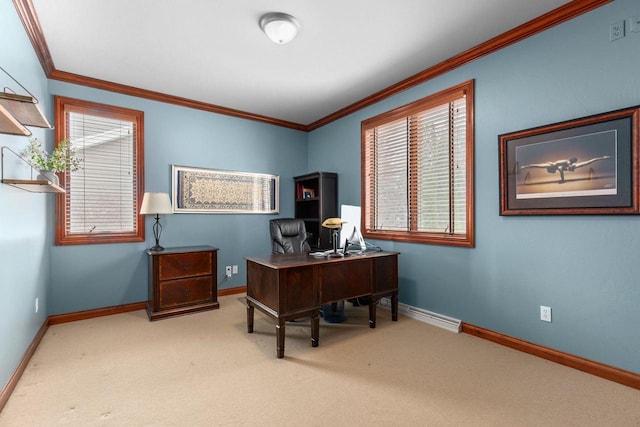 carpeted home office featuring ornamental molding and baseboards