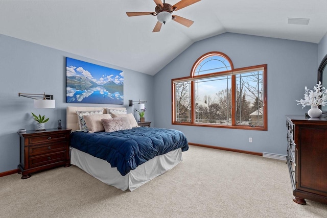 bedroom featuring lofted ceiling, ceiling fan, baseboards, and light colored carpet