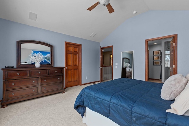 bedroom featuring light carpet, ceiling fan, baseboards, and lofted ceiling