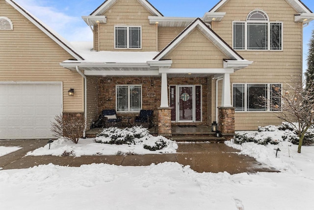 view of front of property featuring a garage