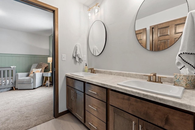 bathroom with double vanity and a sink