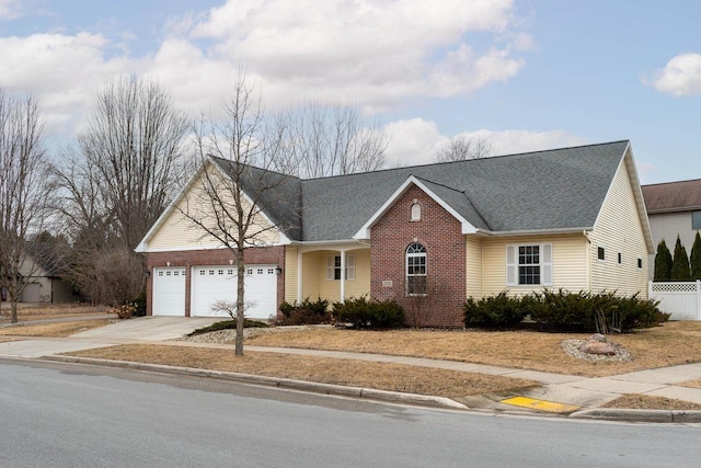 view of front of property with a garage, brick siding, a shingled roof, fence, and driveway