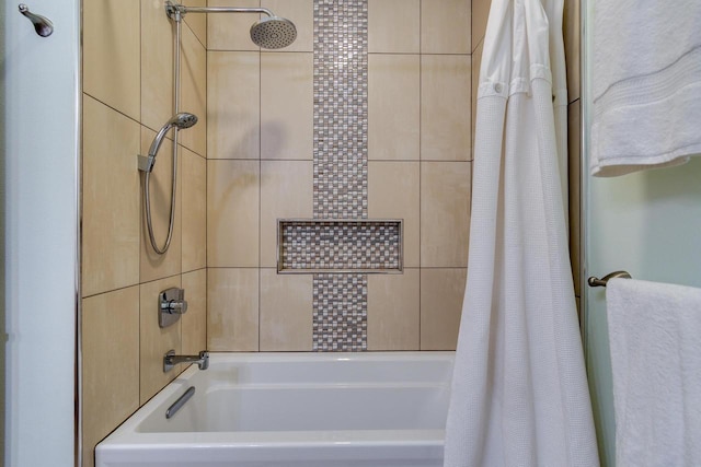 bathroom featuring shower / tub combo with curtain