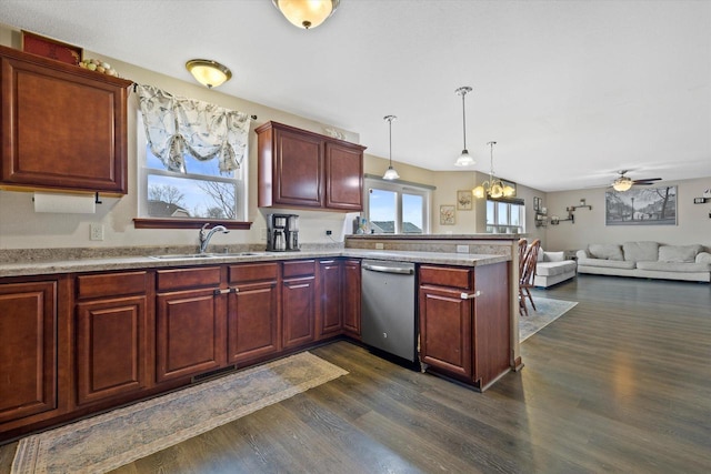 kitchen with dark wood-style floors, stainless steel dishwasher, open floor plan, a sink, and a peninsula