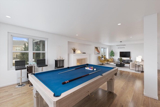 game room featuring recessed lighting, pool table, light wood-style flooring, and baseboards