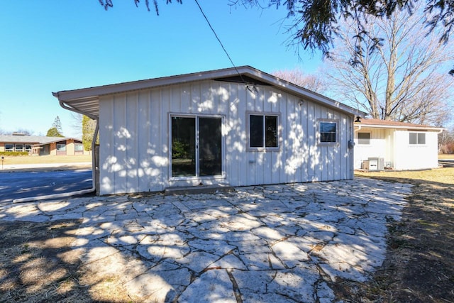 rear view of property featuring a patio