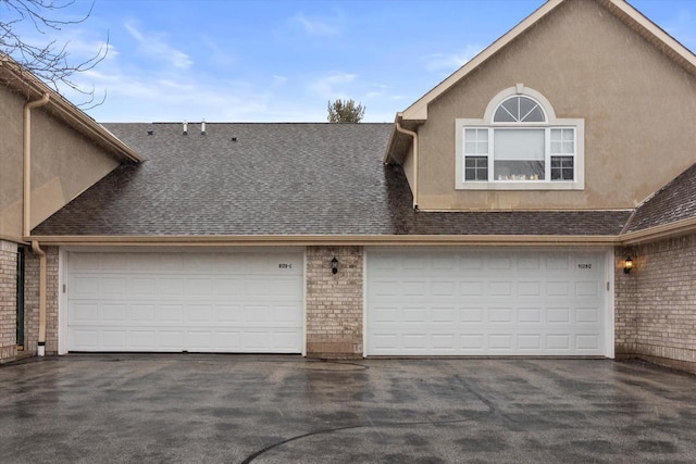 garage with driveway