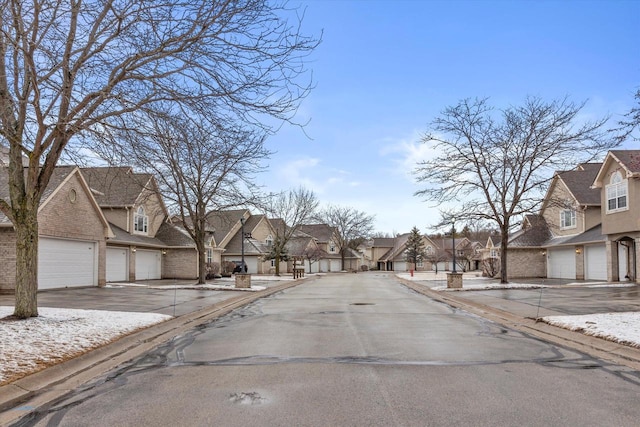 view of road featuring a residential view and curbs