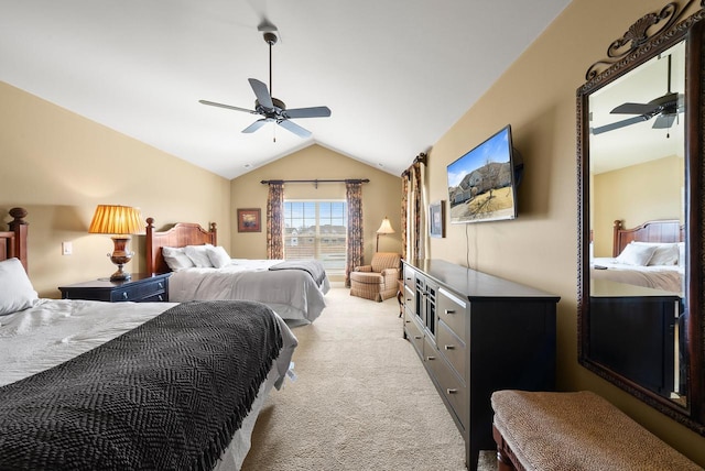 carpeted bedroom with lofted ceiling and ceiling fan