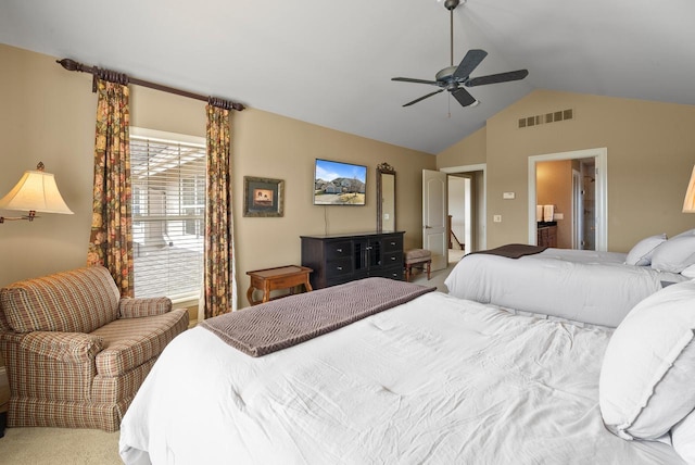 bedroom featuring lofted ceiling, visible vents, ceiling fan, and light carpet