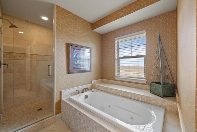 bathroom featuring a stall shower, tile patterned floors, a tub with jets, and wallpapered walls