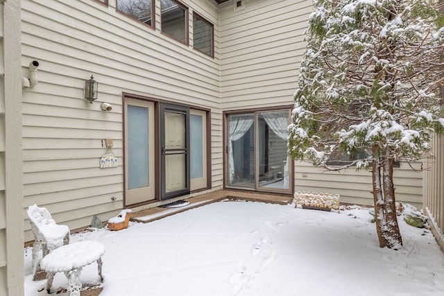 view of snow covered patio