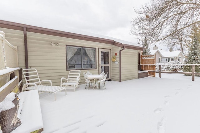 view of snow covered patio