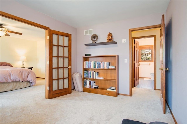 bedroom featuring visible vents, baseboards, carpet flooring, and french doors