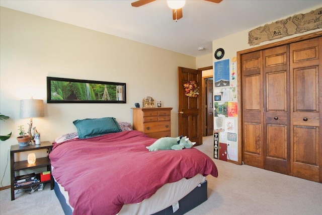 bedroom featuring carpet, a closet, and ceiling fan