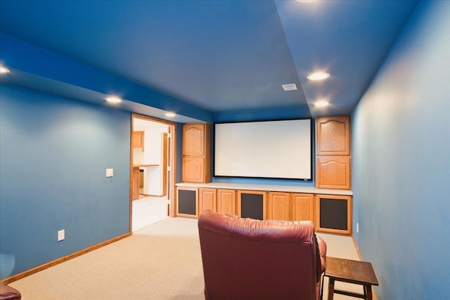 home theater featuring recessed lighting, light colored carpet, and baseboards