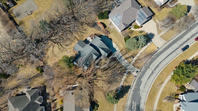 birds eye view of property with a residential view