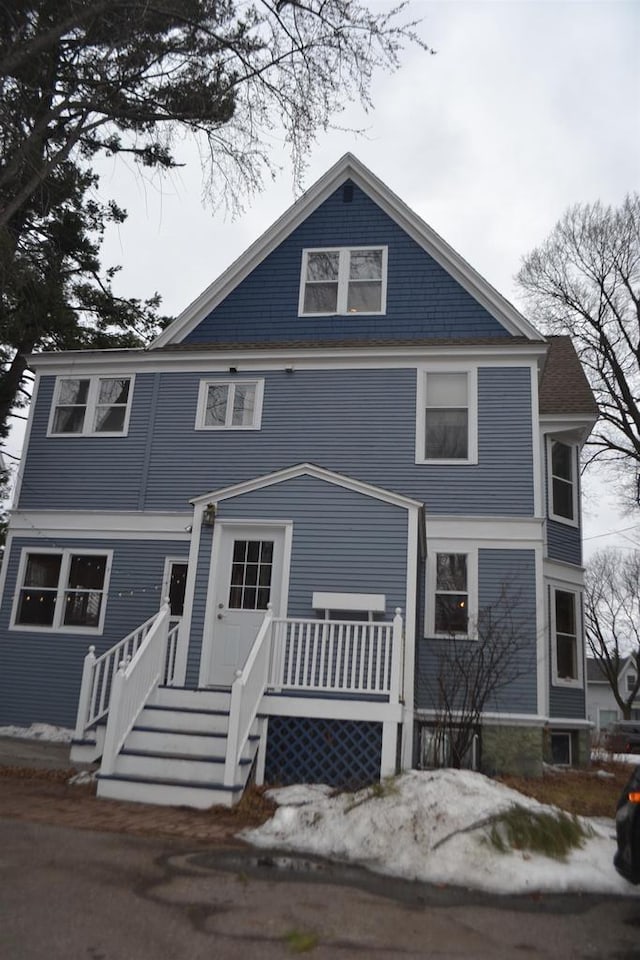 view of front of property featuring a wooden deck