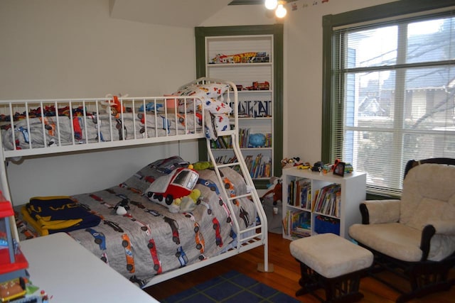 bedroom with wood finished floors