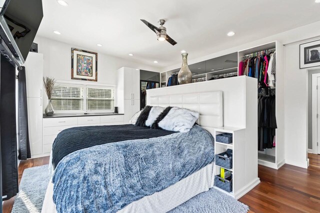 bedroom featuring ceiling fan, wood finished floors, and recessed lighting