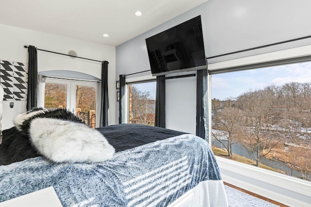 bedroom with access to outside, french doors, and recessed lighting