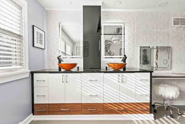 full bath with visible vents and vanity