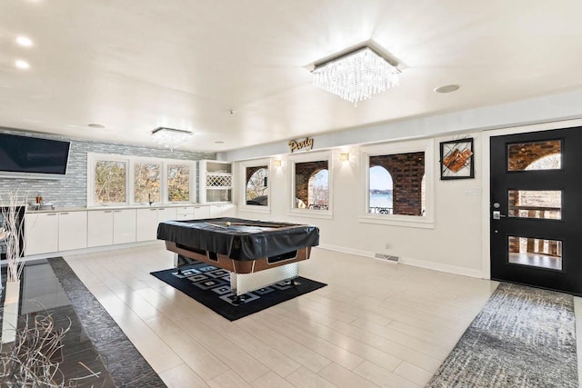 recreation room with pool table, visible vents, and baseboards