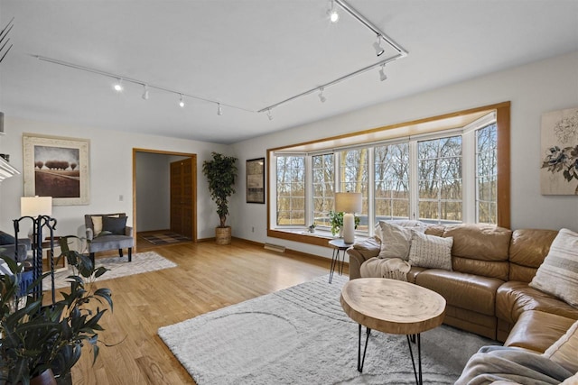 living area featuring light wood finished floors