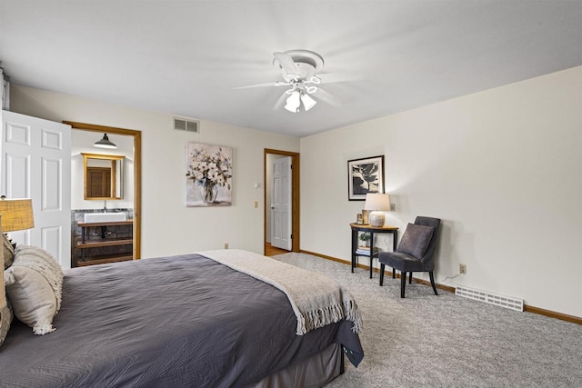 bedroom with visible vents, carpet flooring, baseboards, and ceiling fan