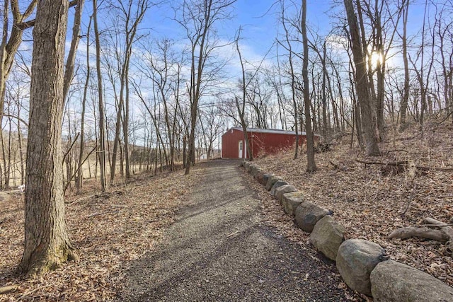 exterior space with an outbuilding and an outdoor structure