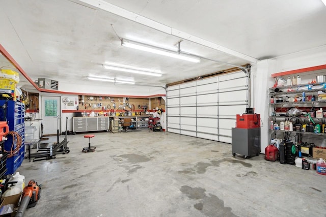 garage with a workshop area