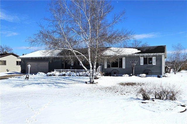 ranch-style home with a garage