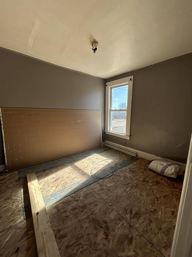 spare room featuring a baseboard radiator