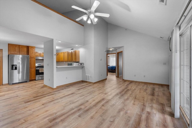 unfurnished living room featuring visible vents, ceiling fan, light wood-style flooring, and baseboards