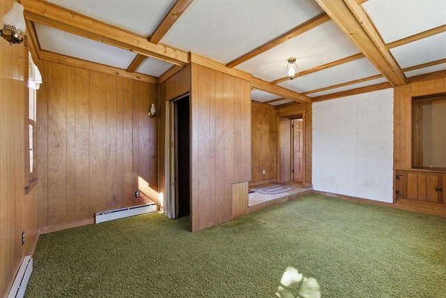 carpeted spare room featuring wood walls, baseboard heating, and beamed ceiling