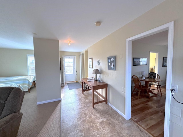 entrance foyer featuring baseboards